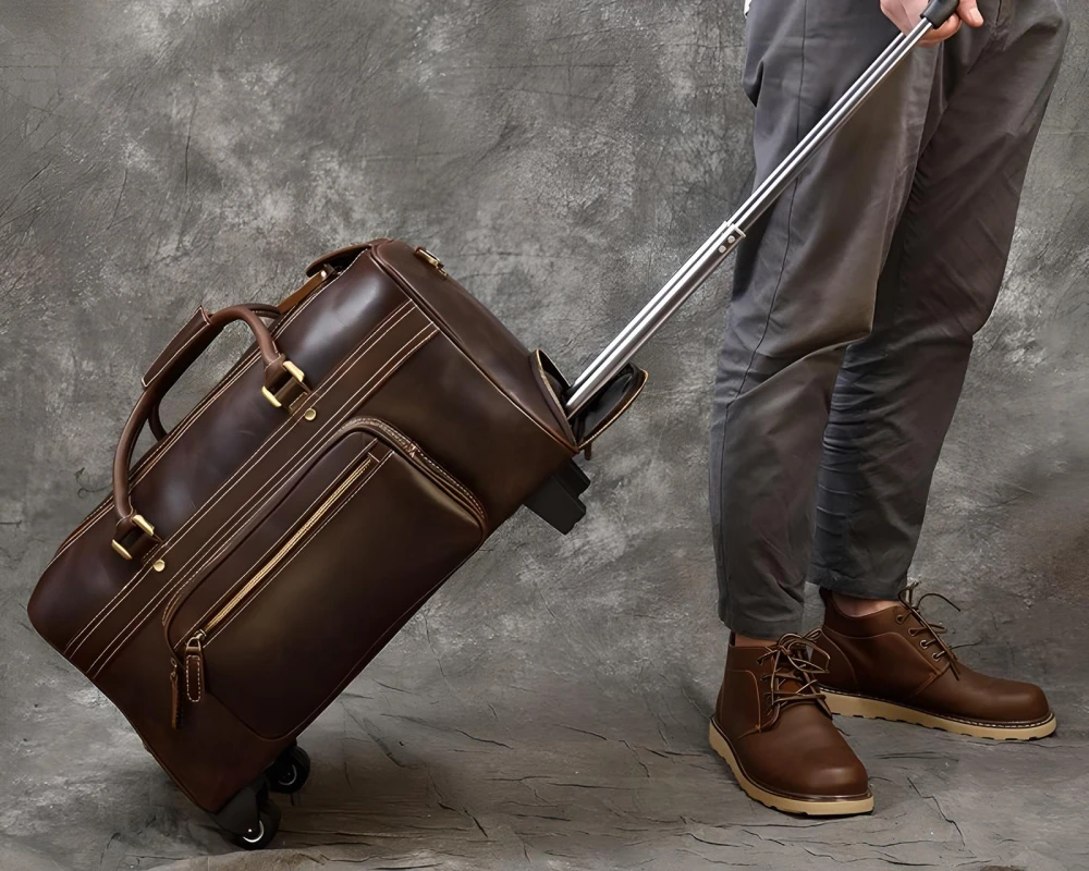 brown leather carry on bag